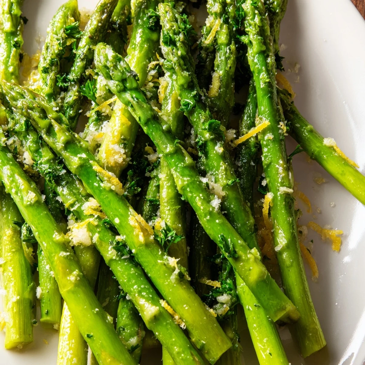 Tender-crisp Lemon Garlic Asparagus spears glisten with olive oil, garlic, and fresh lemon zest for a bright spring side dish.  