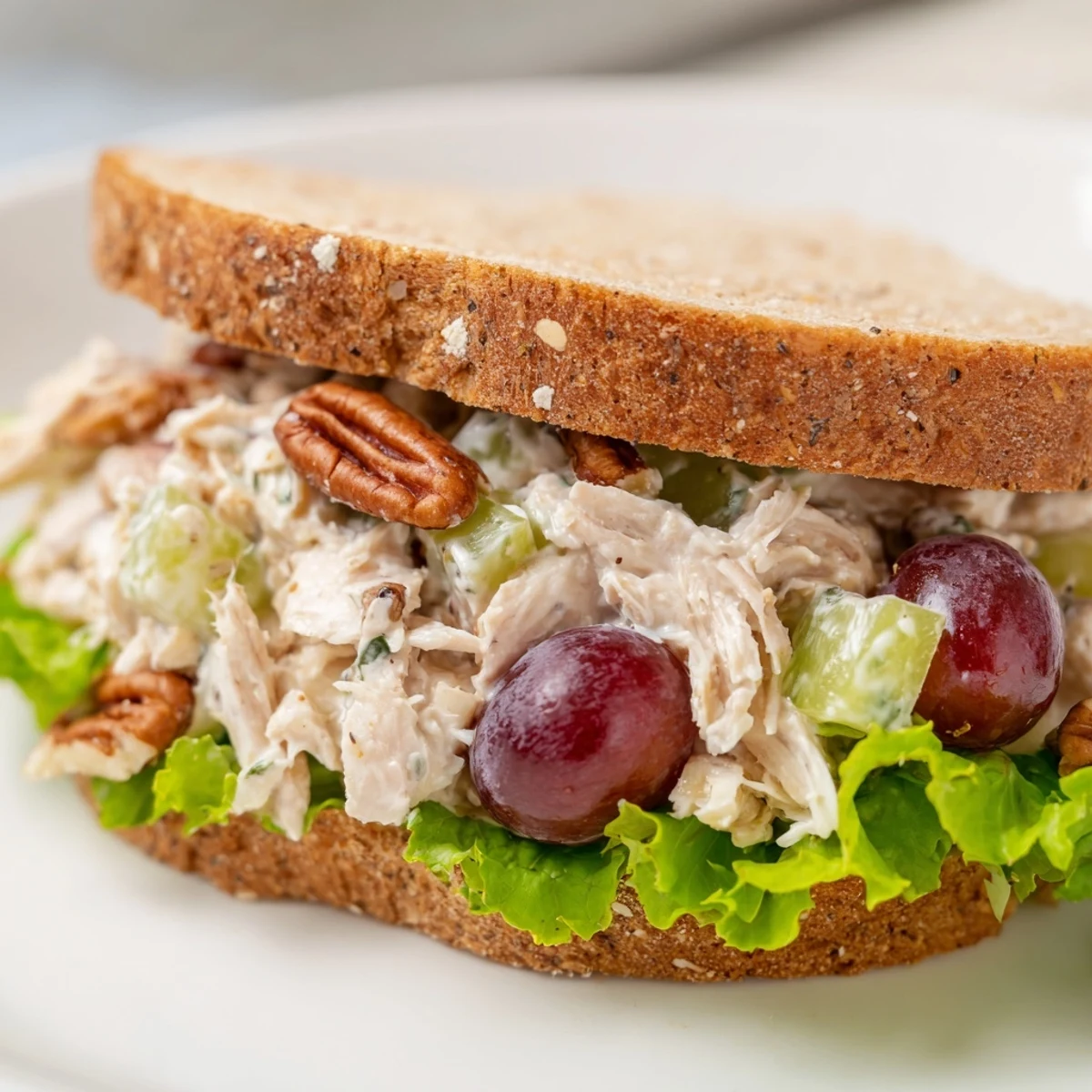 Juicy grapes and tender shredded chicken tossed in a tangy mayo-Greek yogurt blend, garnished with fresh herbs.  