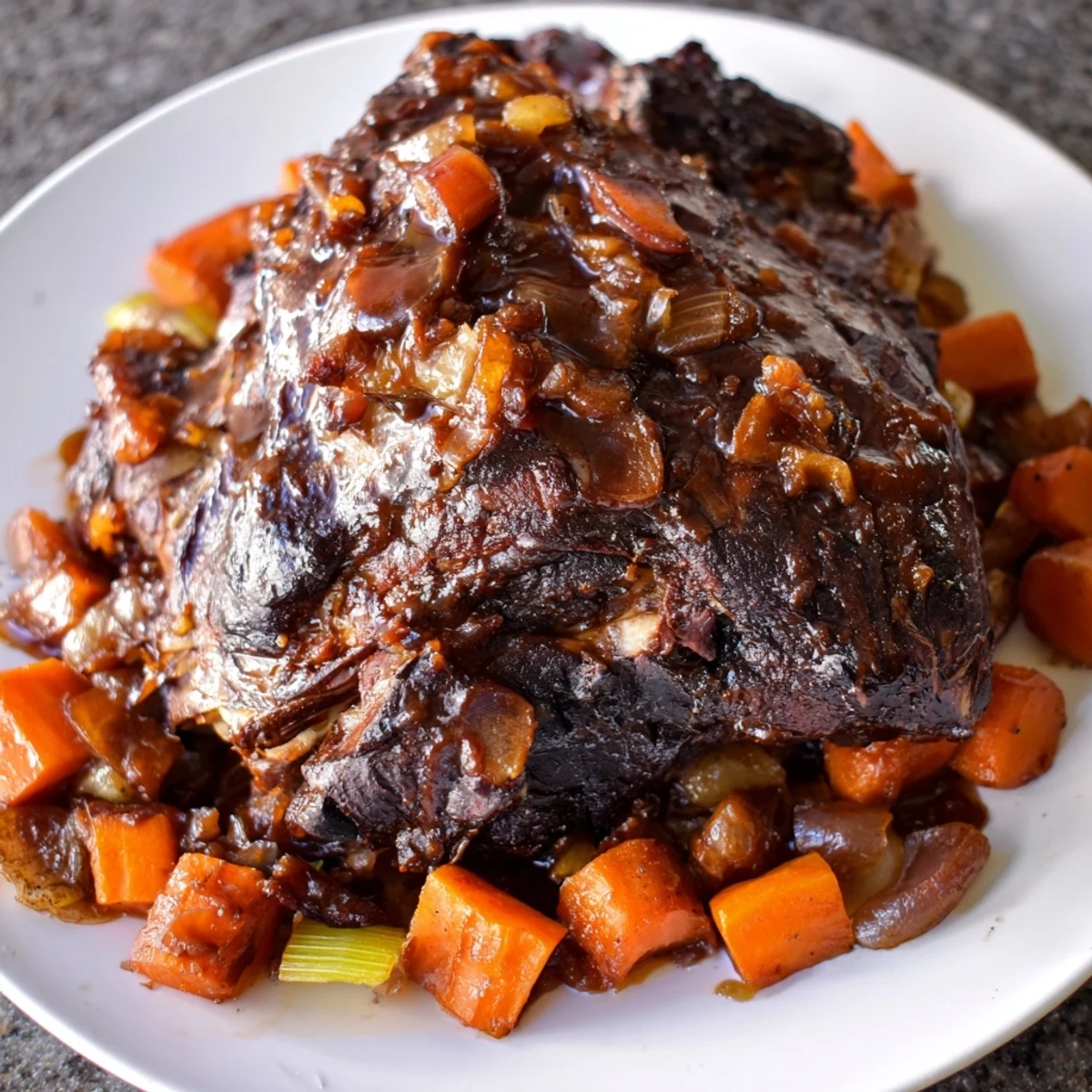 This image shows Braised Lamb Shoulder with Molasses Glaze resting on a rustic wooden board. Slices reveal juicy, pink interior and a caramelized crust, garnished with rosemary and a drizzle of pan sauce.