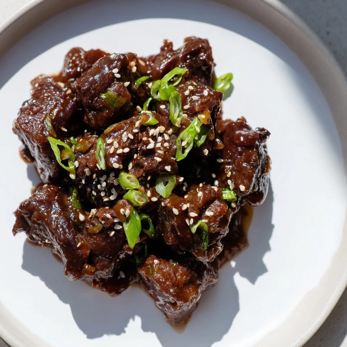 Savory Crock Pot Korean Beef is piled high with veggies in a rustic serving bowl.
