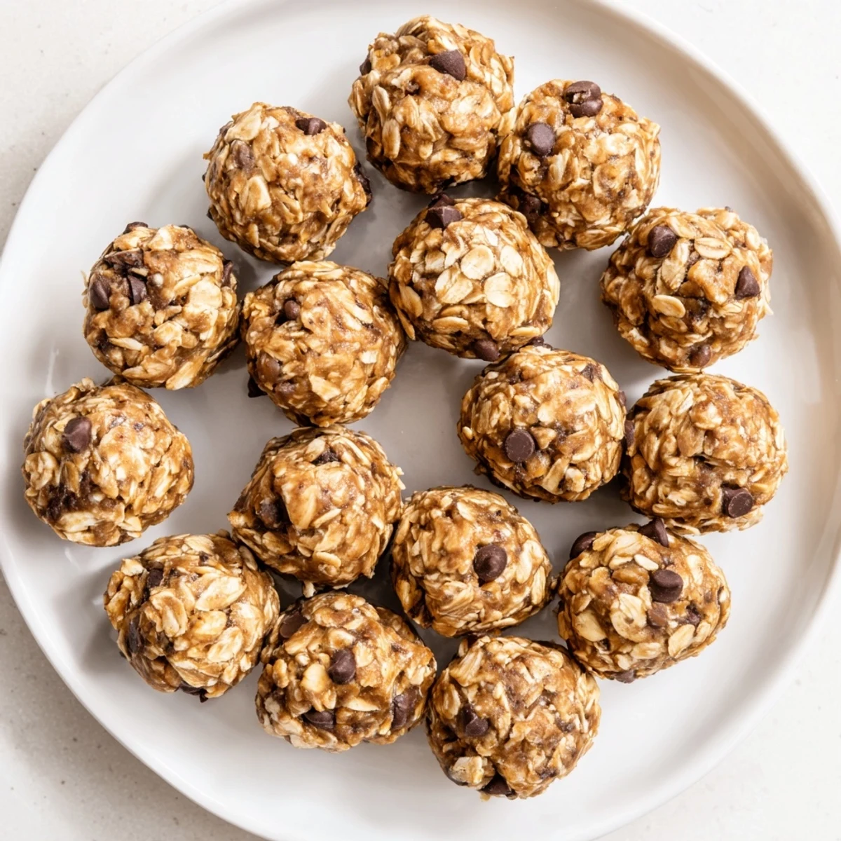 Ready-to-eat No Bake Peanut Butter Energy Bites arranged neatly, ideal for a healthy grab-and-go breakfast in America.