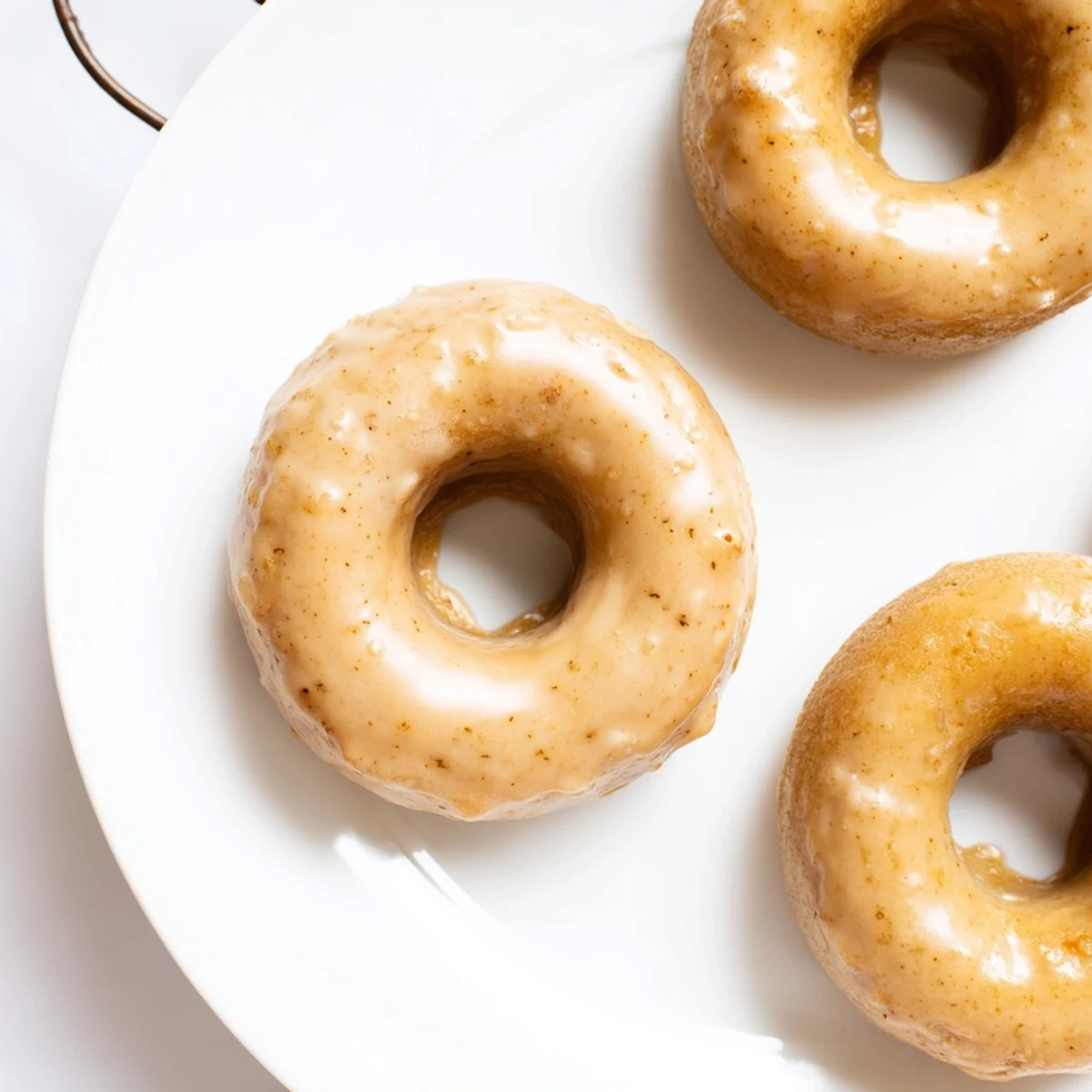 Chewy tea-infused donuts drizzled with Earl Grey icing and dusted with speckled tea leaves