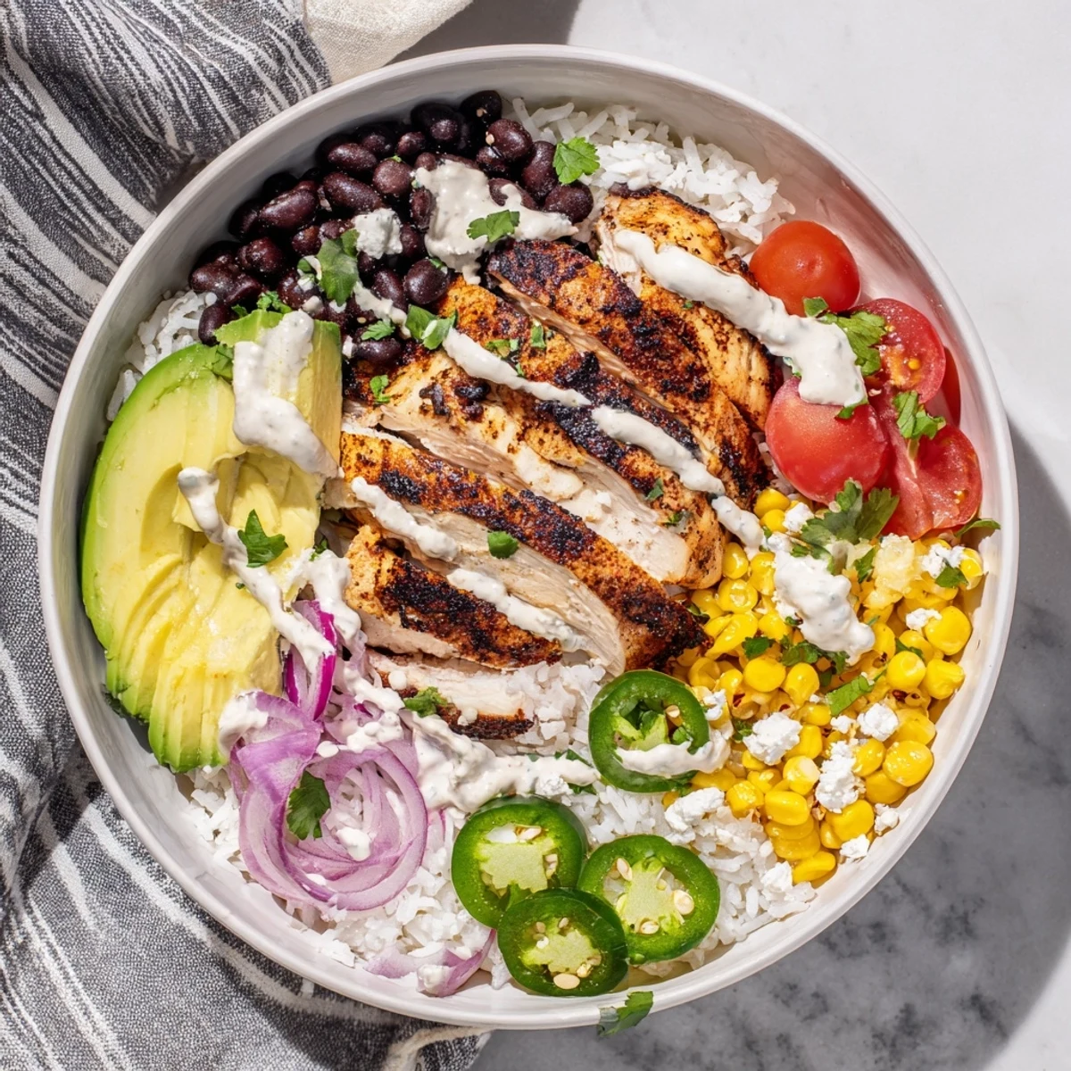Vibrant Mexican Baja style chicken bowl featuring juicy grilled chicken atop cilantro lime rice with fresh toppings